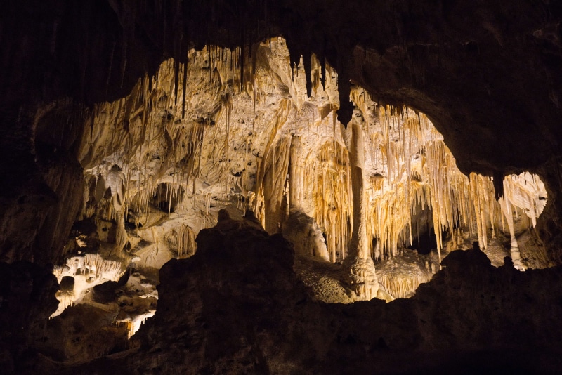 design, natural pattern, stalagmites, no people, beauty in nature, illuminated, caves, solid, eroded, pattern, stalactite, rocks, indoors, limestone, mountain