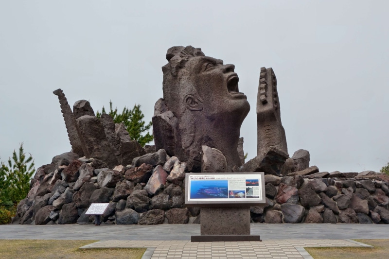 rock, creativity, statue, solid, no people, the past, male likeness, 4K, stone material, ancient civilization, representation, sculpture, day, sky, sakurajima volcano