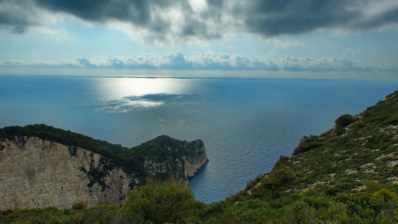 no people, ocean, promontory, vacation, stone, nature, landscape, sun, rocky, 1080P, tranquil scene, outdoor, beauty in nature, scenic, tropical, outdoors
