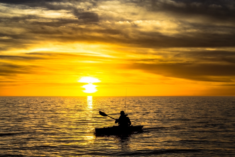 scenics - nature, sun, orange color, waterfront, man, painting, transportation, horizon over water, woman, 4K, leisure activity, kayaks, cloud - sky, outdoors