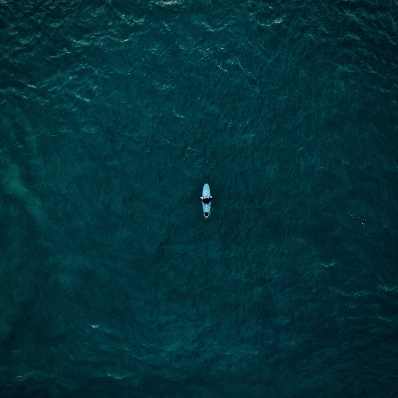 2K, unrecognizable person, surfer, outdoors, drone view, outdoor, boat, tranquil scene, day, edit, nautical vessel, person, calm, tranquility, alone, swimming
