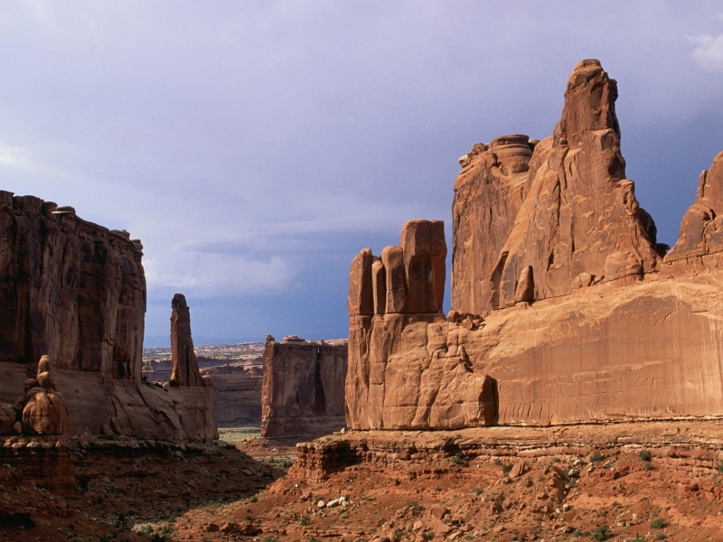 Utah, semi-arid, land, cloud - sky, tranquility, beauty in nature, sandstone, tranquil scene, solid, Arches National Park, sky, environment, non-urban scene