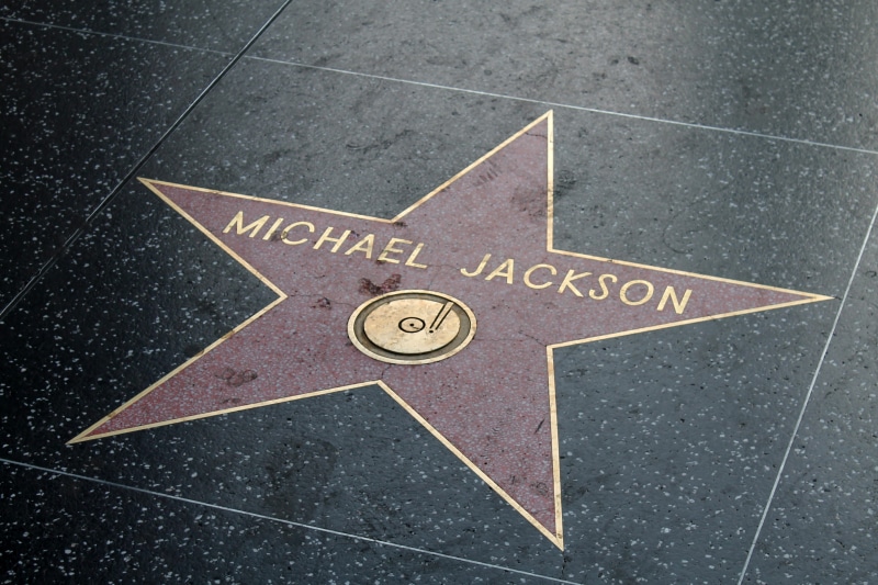 city, hollywood, road, high angle view, walk of fame, direction, flooring, navigational compass, transportation, close-up, star, capital letter, western script