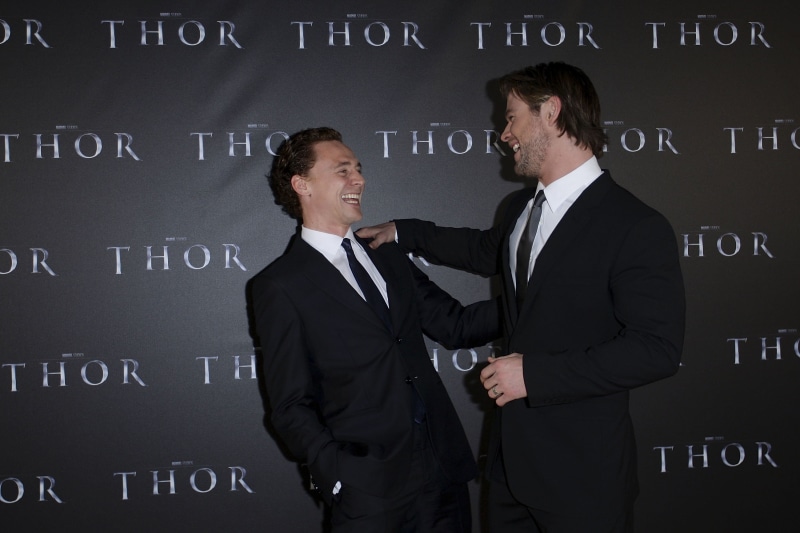 adult, dinner, two people, attending, indoors, chris hemsworth, humor, businessman, clothing, fame, suit, event, men, tom, people, communication, young adult