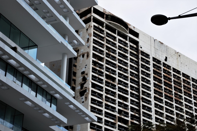 skyscraper, office building exterior, construction industry, city life, window, industry, office, street, built structure, apartment, low angle view, sky