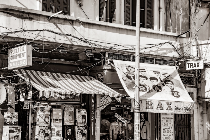 text, outdoors, sign, built structure, communication, electricity, architecture, city, beirut, exterior, hanging, ancient, non-western script, lebanon