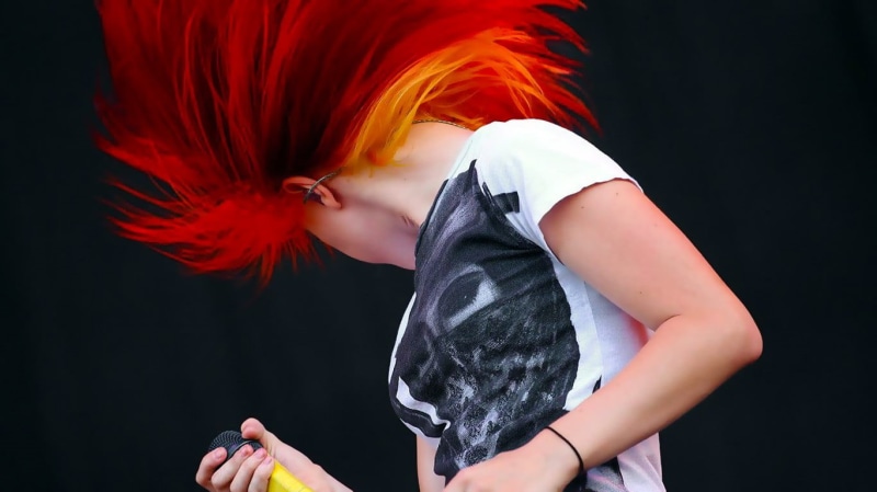 young adult, Paramore, studio shot, hair, singer, indoors, hairstyle, adult, redhead, portrait, black background, 720P, dyed hair, dyed red hair, real people