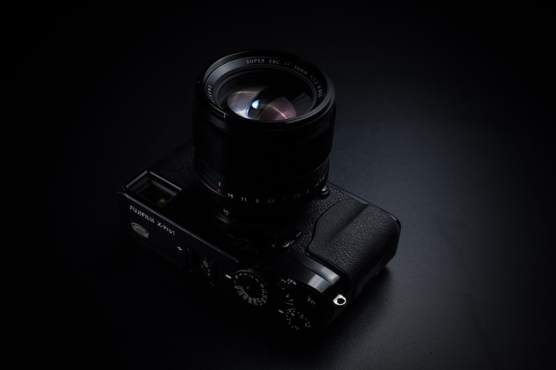 purple, digital camera, lens - optical instrument, electric lamp, studio shot, still life, single object, dslr, lens - eye, camera film, close-up, lens