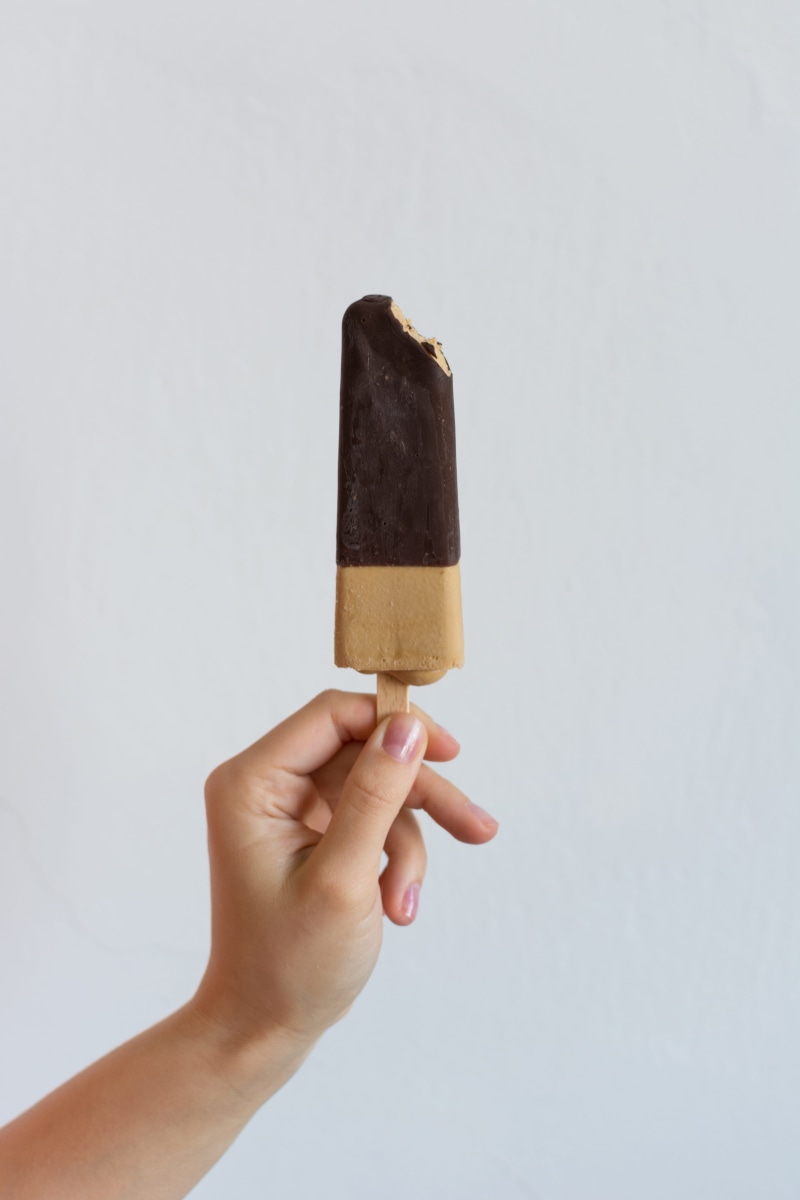 sweet Food, indulgence, holding, single object, refreshment, unrecognizable person, human limb, human Hand, chocolate, flavored Ice, frozen, ice, temptation