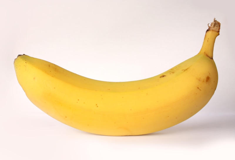 indoors, fruit, eat, white background, copy space, single object, banana, close-up, eating, freshness, wellbeing, food and drink, ripe, simplicity, healthy eating