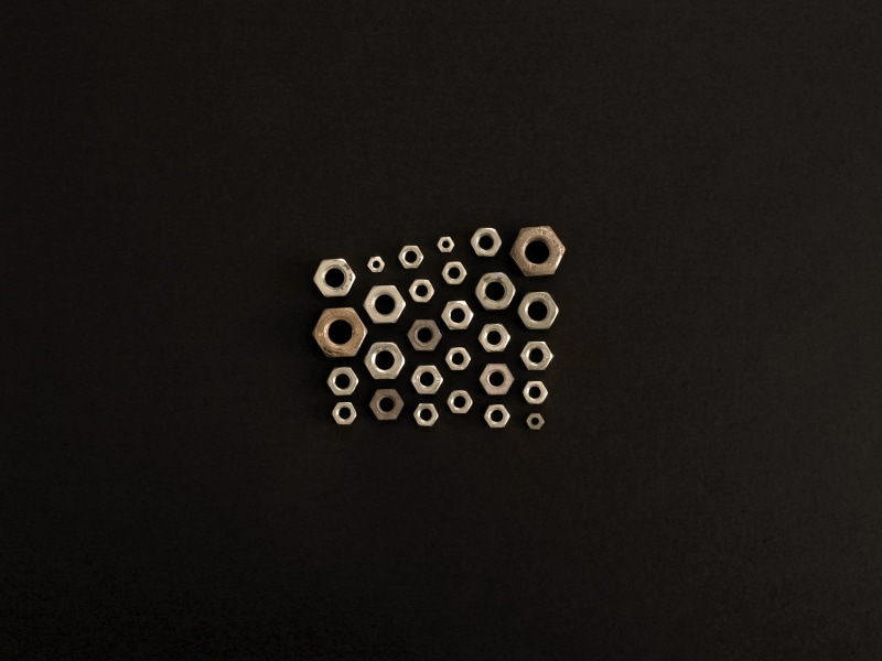rotor, assorted, arrangement, abstract, nuts, push button, directly above, spoke, number, circle, hex, black background, black, sports, black color, indoors