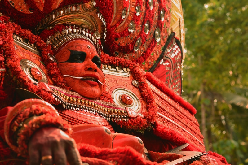 india, statue, outdoors, culture, malabar, religion, goddess, kerala, representation, heritage, close-up, traditional, 5K, red, place of worship, colour