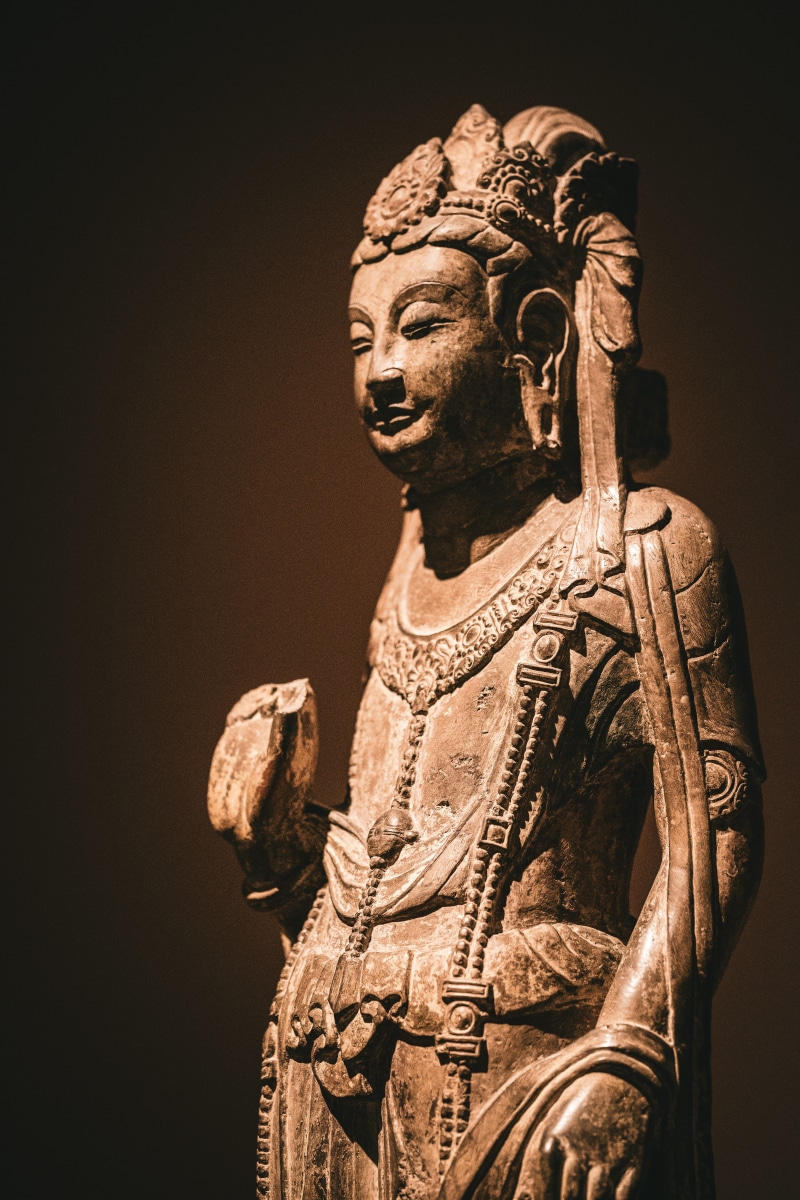 history, architecture, buddha, black background, ancient civilization, craft, figurine, no people, art and craft, the past, hardwood, worship, building