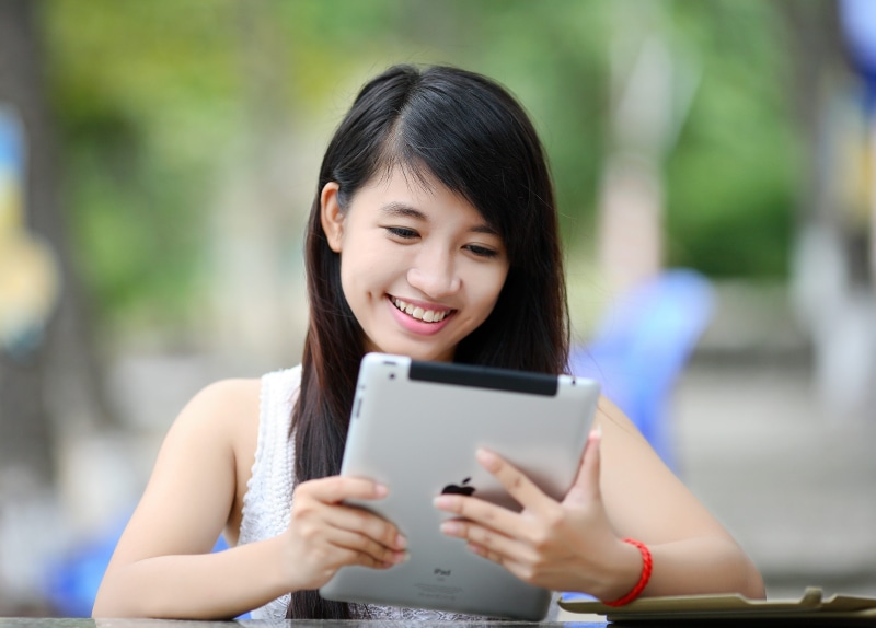daytime, happiness, couch, indoor, computer, device, connected, screen, white, lifestyle, game, casual, single, emotion, parent, modern, smile, console