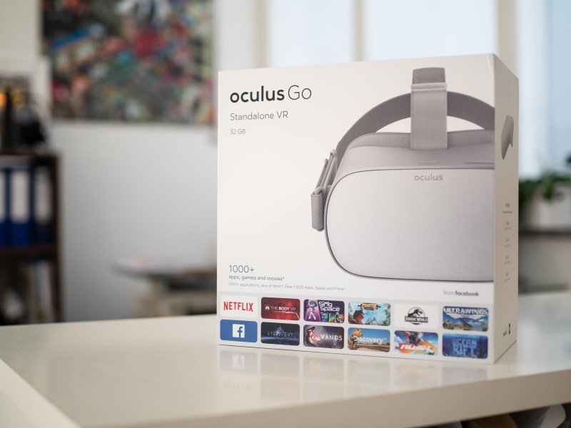 household equipment, paper, transparent, table, text, goggle, printer, focus on foreground, glass - material, reality, headset, vr, equipment, oculus, electronic