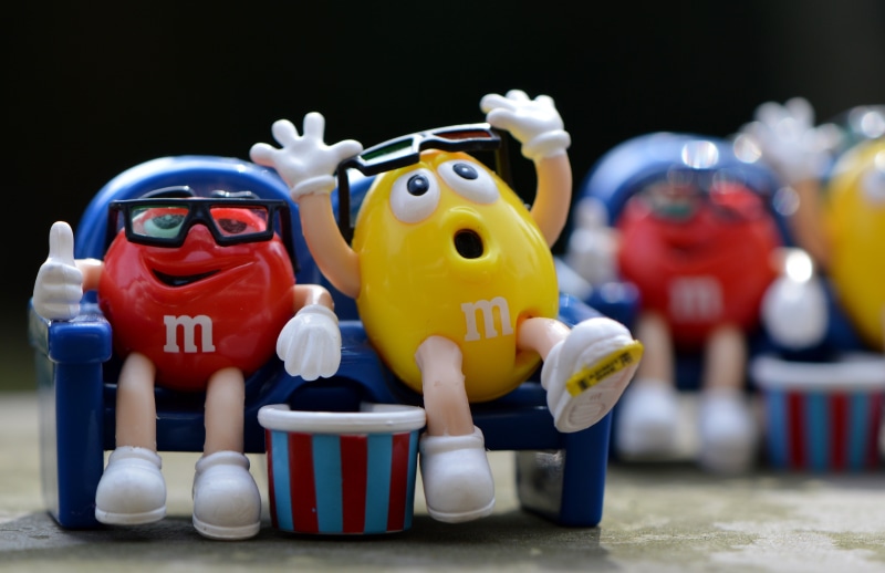 close-up, candy, art and craft, m ms, fun, plastic, black background, funny, creativity, childhood, focus on foreground, red, small, indoors, 3-d glasses