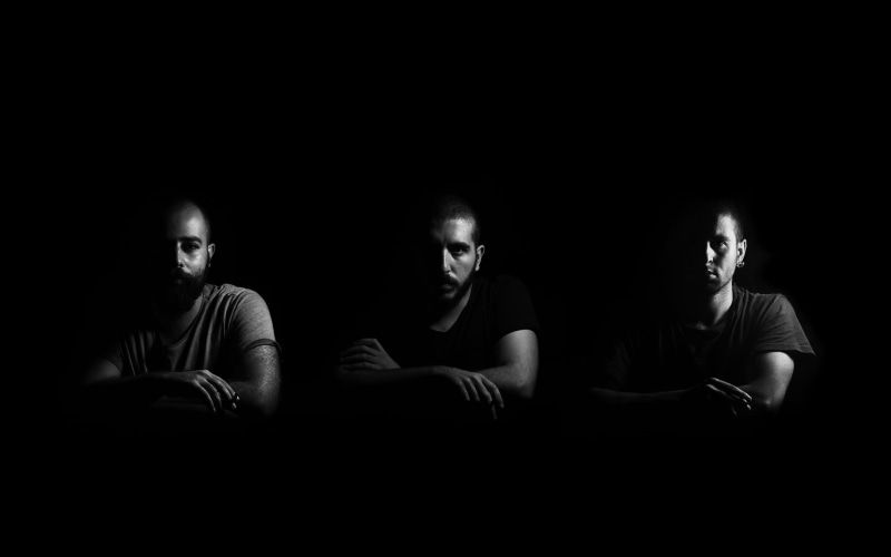 2K, photo, black background, young men, young adult, three, group of people, front view, looking, men, sitting, copy space, technology, photography, black and white