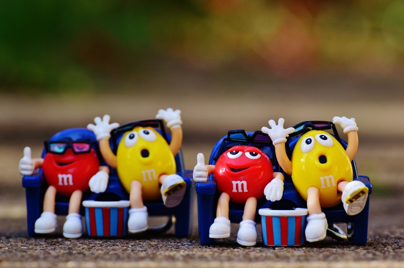 candy, art and craft, side by side, multi colored, figurine, representation, m ms, 4K, plastic, toy, fun, 3-d glasses, focus on foreground, variation