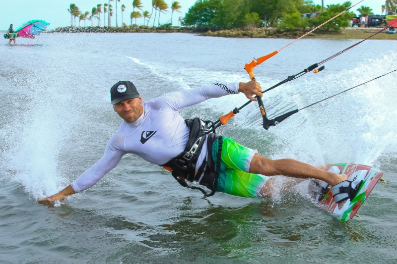surfer, leisure activity, daylight, person, waterfront, rashguard, sport, adult, day, beach, wearing, fun, sea, leisure, motion, water, young men, aquatic sport