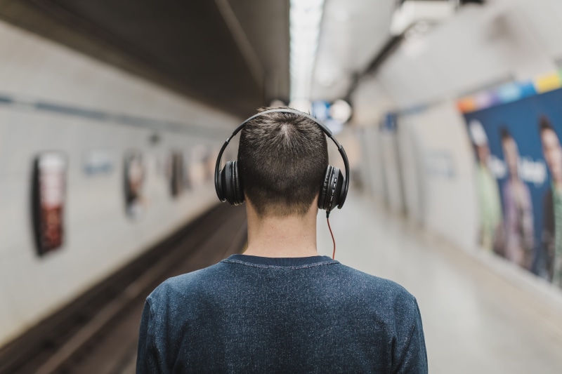portrait, men, listen, listening, lifestyles, technology, adult, subway platform, device, person, electronics, light, headphones, tunnel, wear, leisure activity