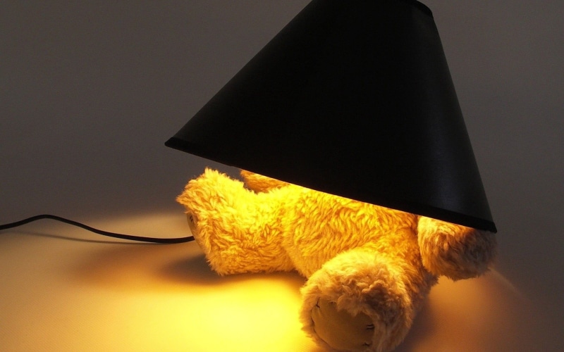 domestic room, no People, feline, brown, close-up, indoors, table, lamp, toy, animal, bear, cat, still life, hat, black, light, pets, 1080P, backgrounds