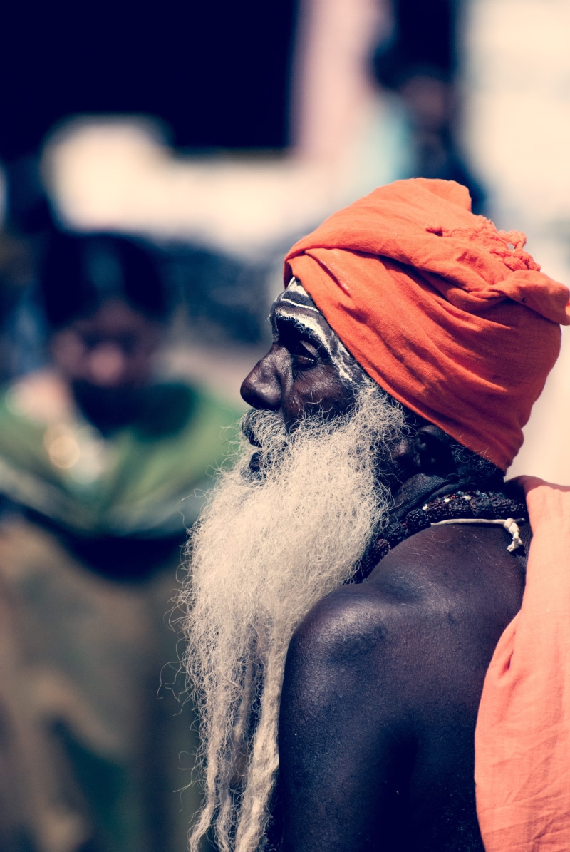 lifestyles, red scarf, leisure activity, human body part, real people, costume, orange, sadhu, focus, wearing, bearded, portrait, men, mature adult, women