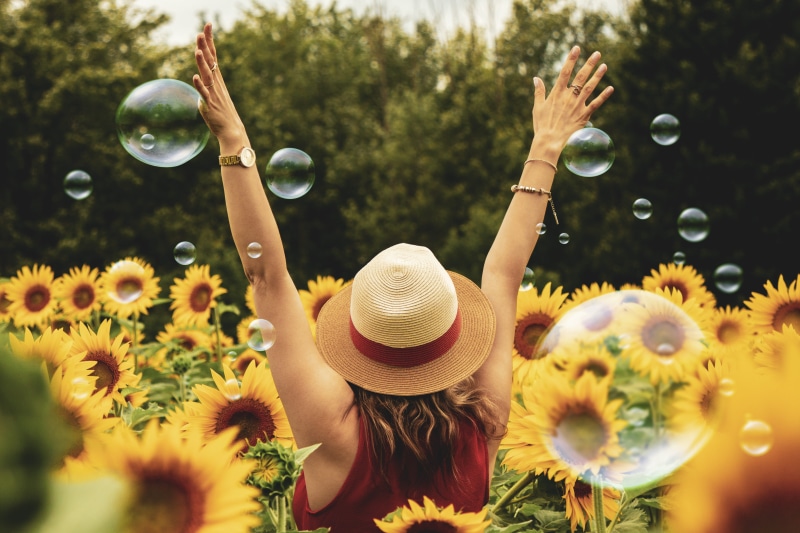 outdoors, blooming, joy, close-up, sunflowers, real people, hat, day, vulnerability, plant, lady, flowers, adult, young adult, fun, person, 5K, photography