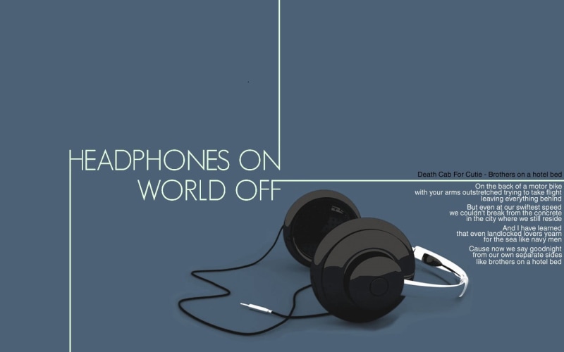 input device, black, blue, text, arts culture and entertainment, close-up, listening, copy space, connection, audio equipment, no people, cable, technology