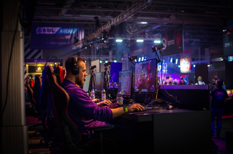 entertainment occupation, performance, nightlife, lighting equipment, people, man, gamer, lifestyles, communication, gamers, competition, headphones, real people