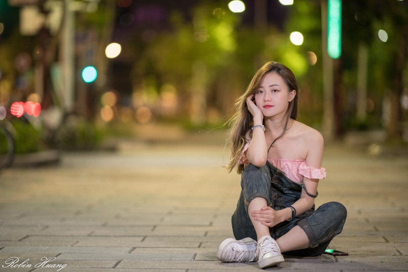 hairstyle, looking at camera, front view, leisure activity, 1080P, portrait, beautiful woman, teenager, young adult, model, depth of field, outdoors, architecture