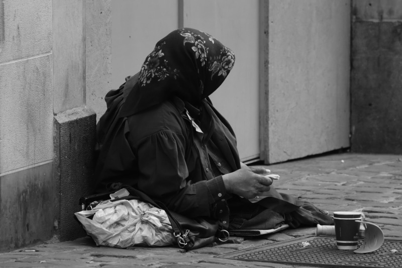homelessness, unhygienic, one person, social issues, sitting, wall - building feature, floor, alms, begging - Social Issue, begging, sadness, poverty, despair