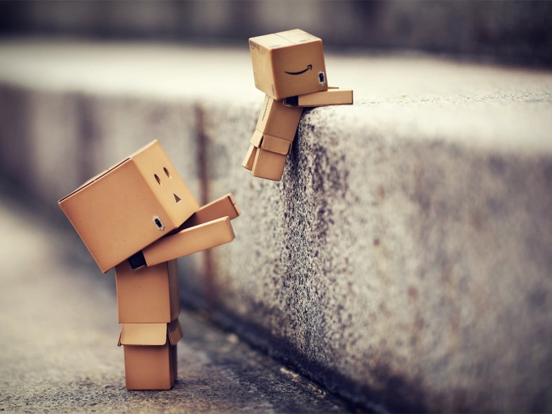 no people, robot, creativity, 720P, figurine, art and craft, technology, toy, wood - material, Danbo, cardboard, male likeness, outdoors, box, focus on foreground