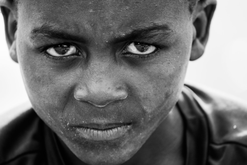 one person, ethnicity, boy, child, males, human body part, 5K, confidence, human face, young adult, sadness, mid adult, black, african, poverty, photography
