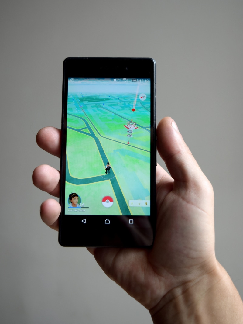 portable information device, studio shot, finger, smartphone, technology, human hand, game, close-up, gps, online, using phone, connection, application