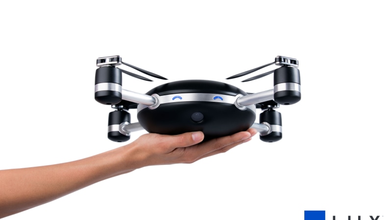 selfie quadrocopter, drone lily, CAMERA DRONE, black, 5K, person, gray, Hi-Tech News of 2015, holding, drone