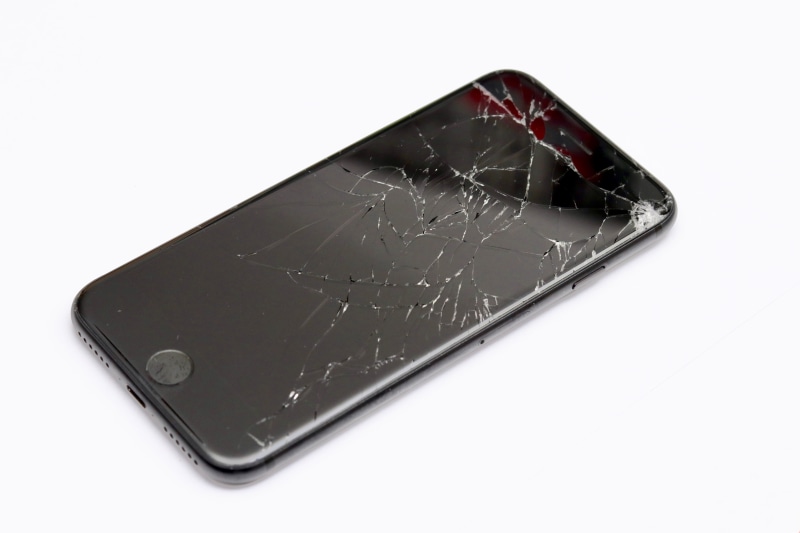 crack, apple, disc, equipment, copy space, display device, iphone, cellphone, indoors, cracked, finger, malfunction, spiderapp, damage, single object, smartphone
