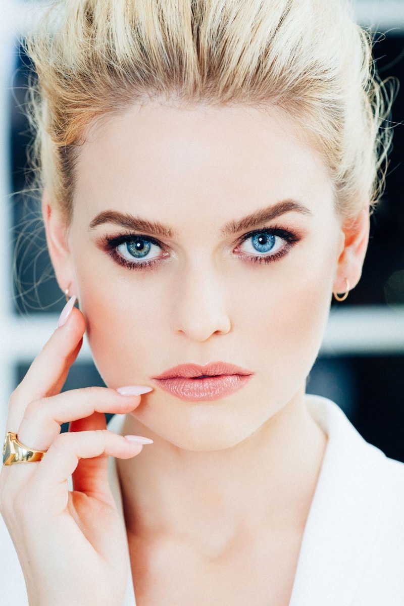 beauty, headshot, heterochromia, beautiful woman, looking at camera, close-up, human face, human body part, one person, gold, blonde, young adult, hand on face