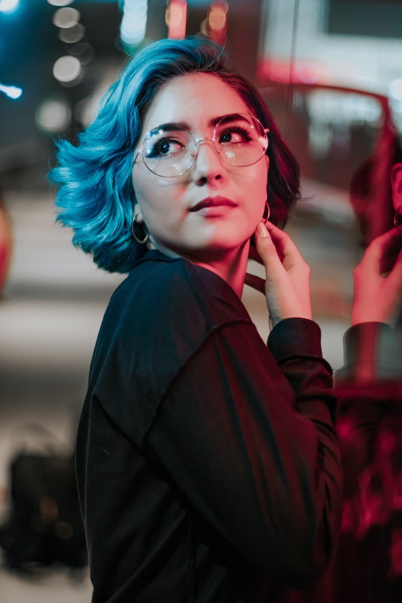 waist up, 5K, facial expression, young adult, eyeglasses, woman, hands, pretty, blur, real people, youth, skin, young women, focus on foreground, adult