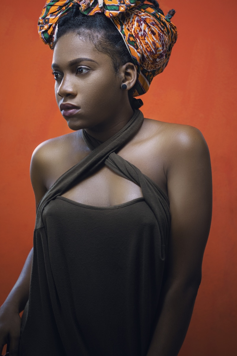 indoors, red background, girl, lip, looking, front view, beautiful woman, portrait, ethnic, women, near, african woman, standing, teenager, waist up, backgrounf red