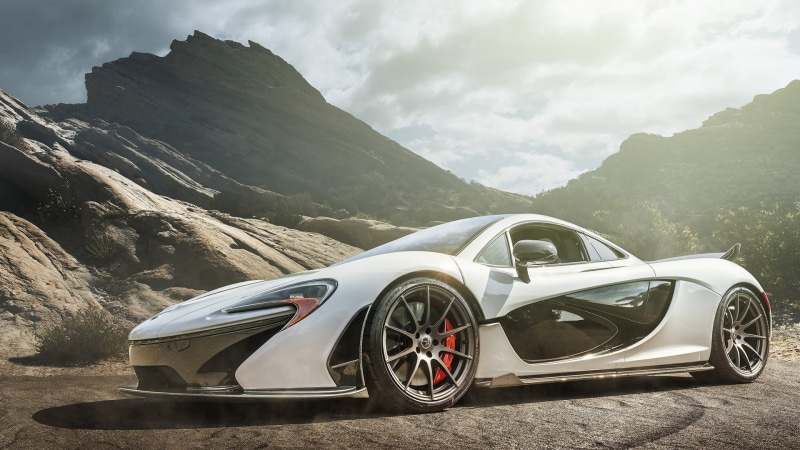 day, sunlight, motor vehicle, supercar, sky, luxury, no people, non-urban scene, cloud - sky, beauty in nature, mountain, McLaren P1, wheel, land vehicle