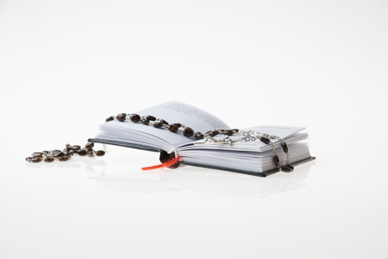 day, still life, equipment, cross, metal, copy space, close-up, business, indoors, heap, stack, pray, man made, book, small, no people, high angle view