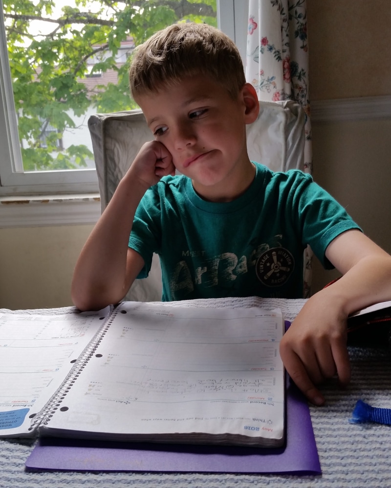 learning, real people, shirt, front view, education, boys, book, student, sitting, paper, notebook, male, table, males, front, studying, wearing, homework