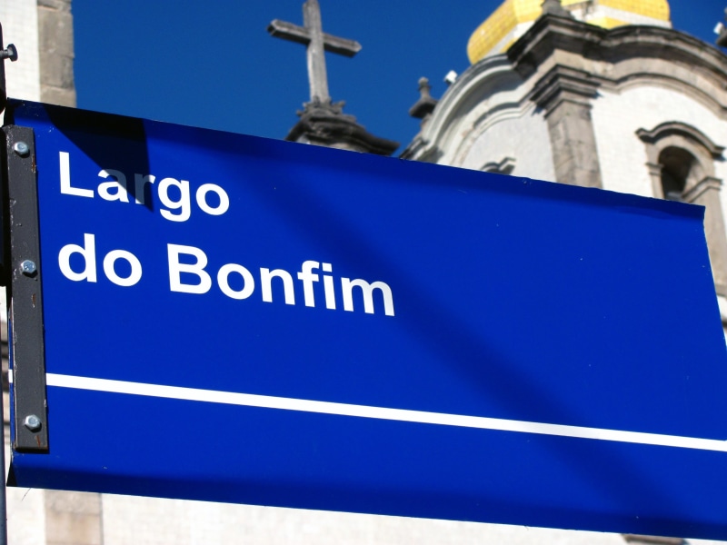 architecture, blue, sign, built structure, communication, identification, religion, plate, outdoors, local, low angle view, focus on foreground, building exterior