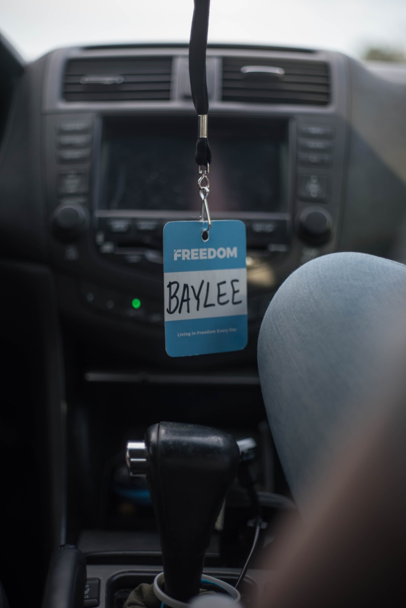 no people, mode of transportation, blue, close-up, 4K, vehicle interior, communication, selective focus, land vehicle, travel, western script, transportation