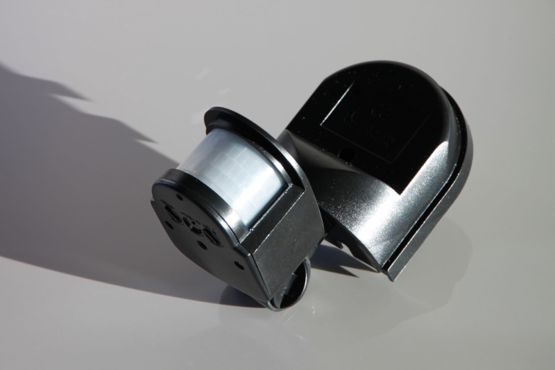still life, motion, sensors, indoors, gray background, gray, protection, shadow, black, Infrared, white background, no people, connection, metal, security