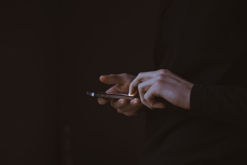 mobile, man, one Person, business, phone, close-up, studio shot, black background, weapon, men, 5K, hand, mobile Phone, person, wireless Technology, telephone