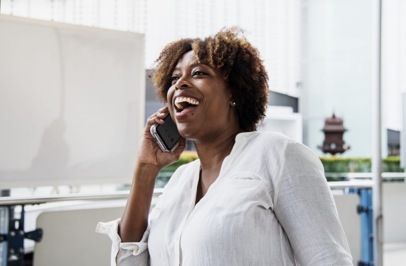 wireless technology, african, information, device, businesswoman, internet, cheerful, data, media, headshot, women, using phone, community, connecting
