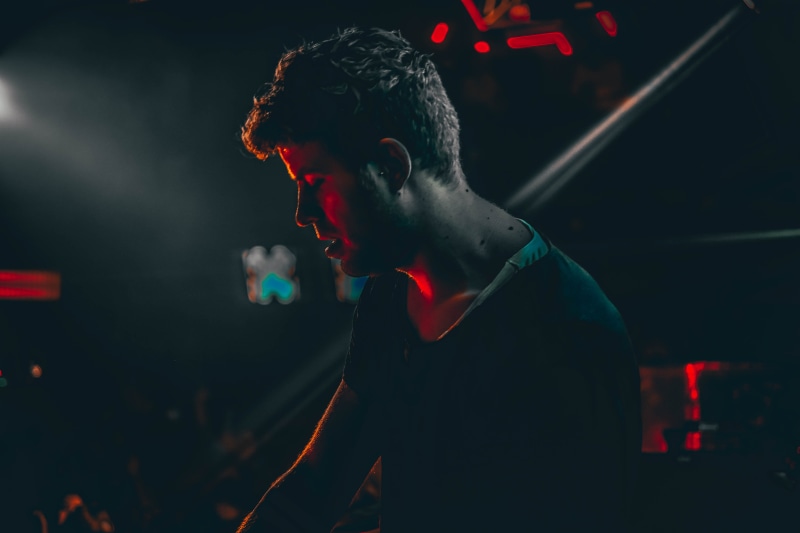 performance, profile view, lighting Equipment, adult, stage - Performance Space, input device, neck, popular Music Concert, stage Light, people, stage