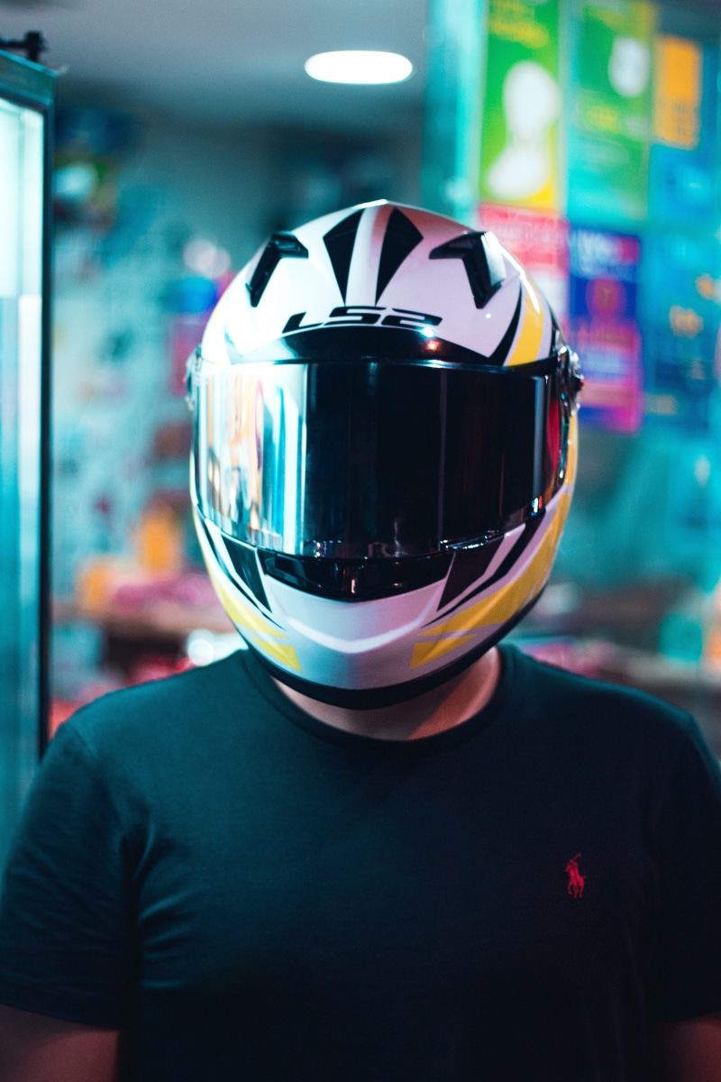 outdoors, visor, incidental people, brazilian, brazil, 5K, feirinha de artesanato de tambaú., reflection, chrome, standing, one person, reflect, night