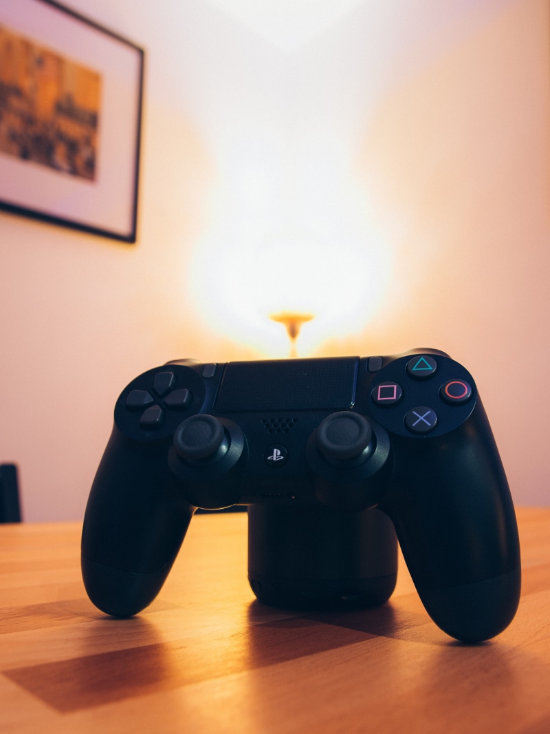 furniture, playstation, camera - photographic equipment, controller, sony, ps4, home interior, flooring, electronics, photography themes, equipment, wireless technology